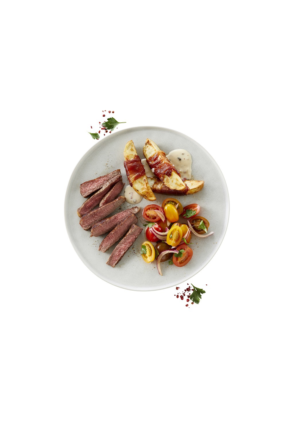 Entrecote med pebersauce, parmakartofler og tomatsalat