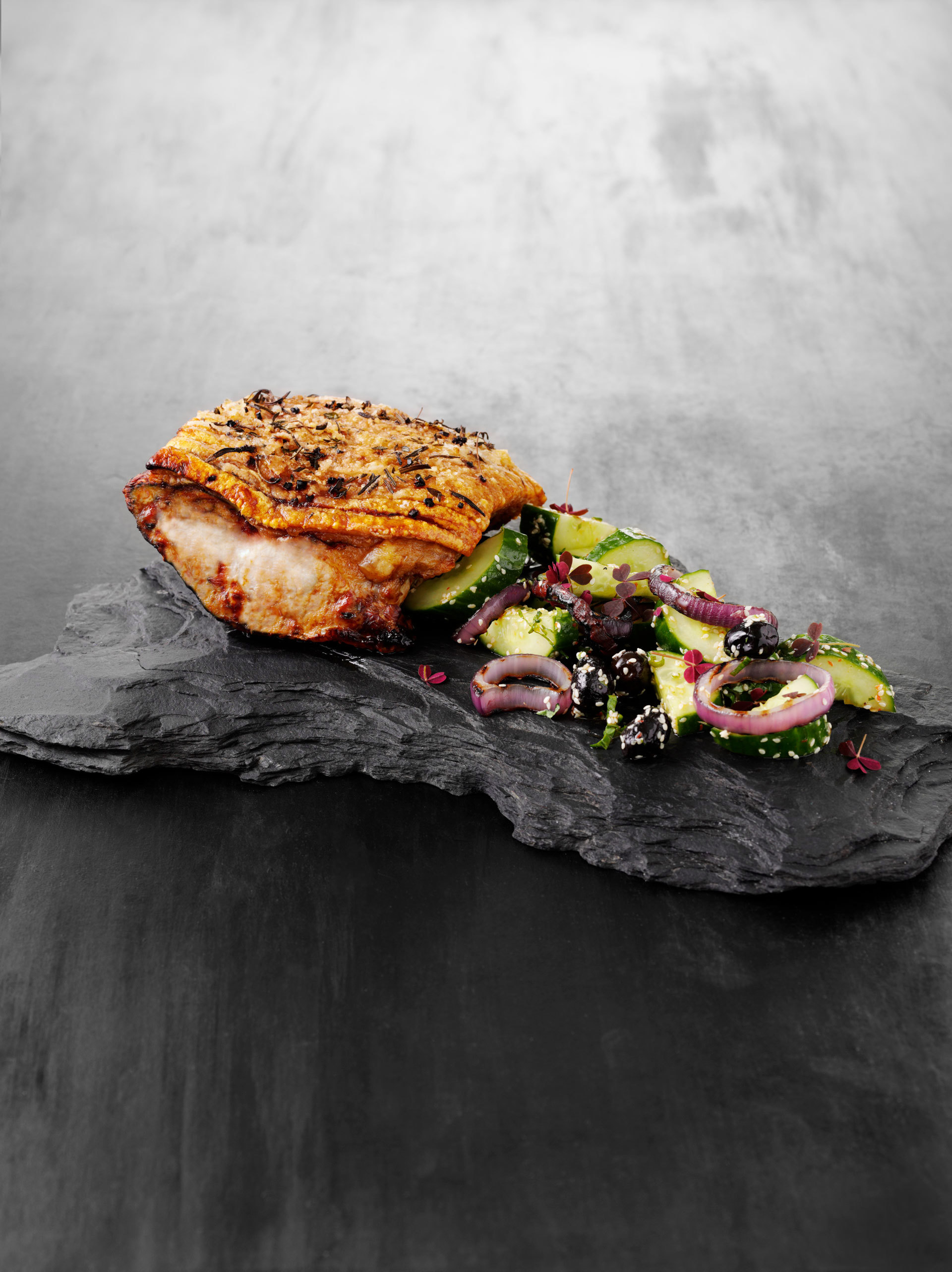 Herb-marinated pork loin with cucumber salad